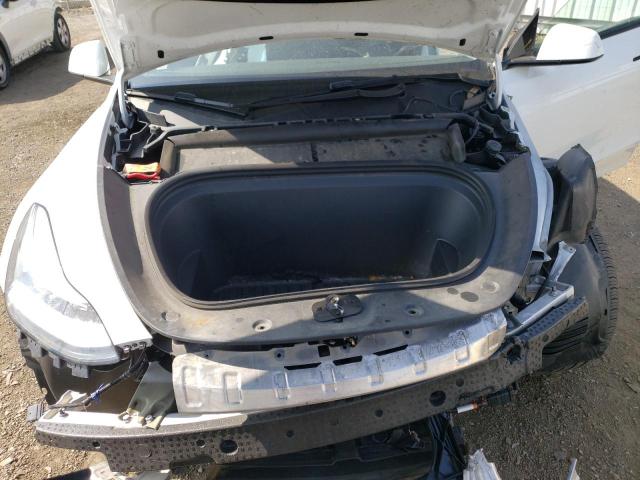 Photo 11 from auction – 2021 TESLA MODEL Y with VIN 5YJYGAEE4MF234934