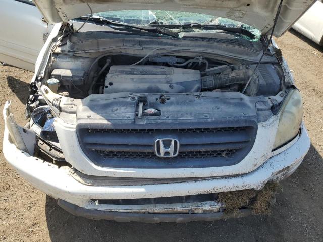 Photo 12 from auction – 2004 HONDA PILOT EXL with VIN 5FNYF185X4B002403