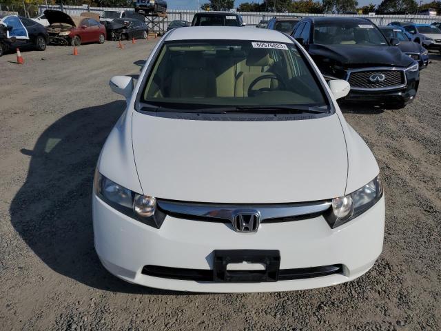 Photo 5 from auction – 2006 HONDA CIVIC HYBR with VIN JHMFA36256S003070