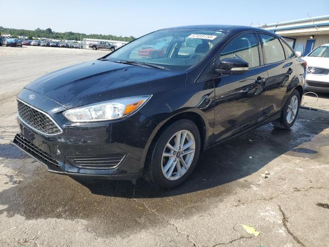 FORD FOCUS SE 2018 with VIN 1FADP3FE8JL257303 - Photo from auction