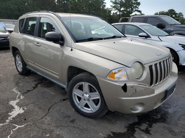 Photo 4 from auction – 2010 JEEP COMPASS SP with VIN 1J4NT4FB6AD558341