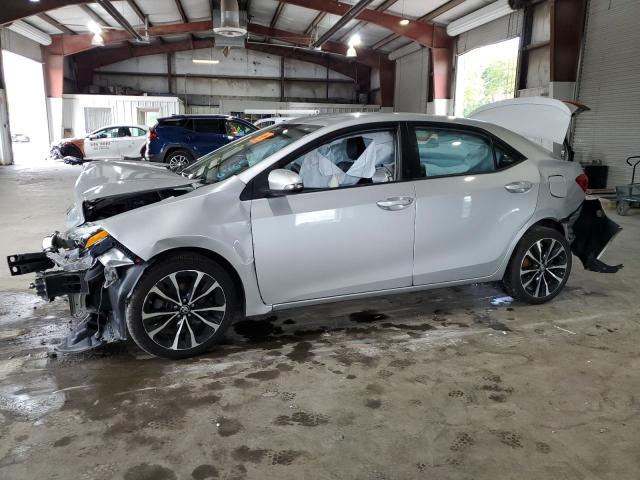 TOYOTA COROLLA L 2017 with VIN 5YFBURHE1HP648501 - Photo from auction