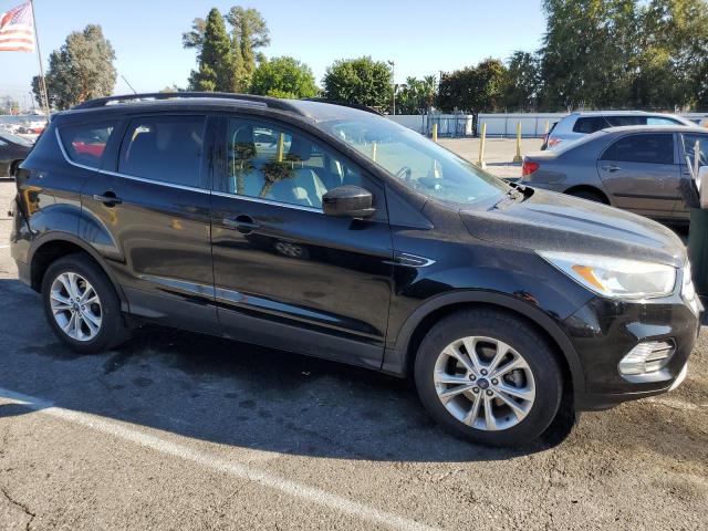 Photo 4 from auction – 2018 FORD ESCAPE SE with VIN 1FMCU0GD5JUA12130