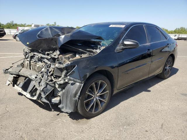 TOYOTA CAMRY LE 2015 with VIN 4T1BF1FK6FU874730 - Photo from auction