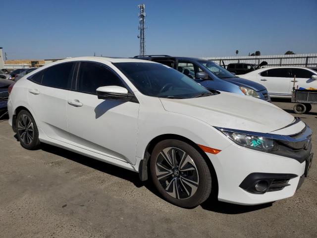 Photo 4 from auction – 2018 HONDA CIVIC EX with VIN JHMFC1F32JX009265