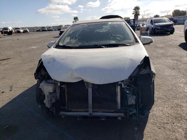 Photo 5 from auction – 2015 TOYOTA PRIUS C with VIN JTDKDTB37F1108091