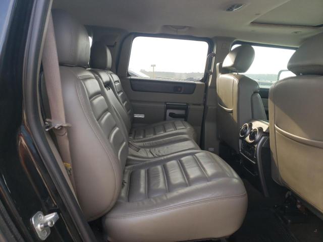 Photo 11 from auction – 2003 HUMMER H2 with VIN 5GRGN23U93H132317