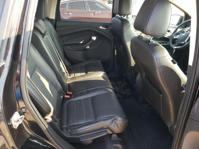 Photo 11 from auction – 2014 FORD ESCAPE TIT with VIN 1FMCU0J97EUE58029