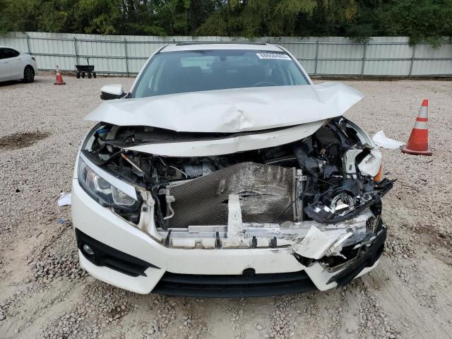 Photo 5 from auction – 2018 HONDA CIVIC EX with VIN 2HGFC1F34JH641238