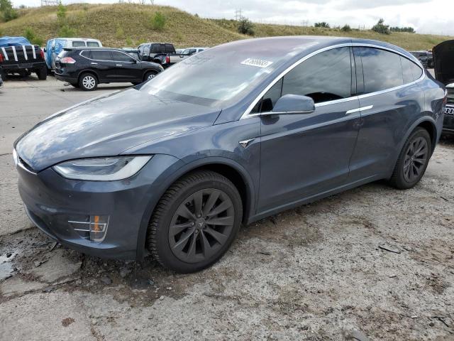 TESLA MODEL X 2018 with VIN 5YJXCBE2XJF087663 - Photo from auction