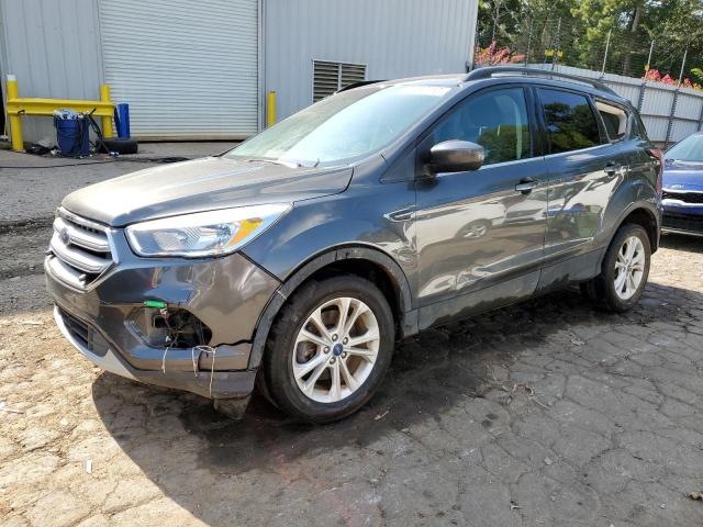 FORD ESCAPE SE 2018 with VIN 1FMCU9GD1JUD56056 - Photo from auction