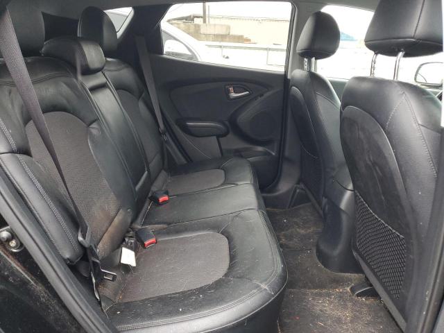 Photo 11 from auction – 2012 HYUNDAI TUCSON with VIN KM8JUCAC0CU346299