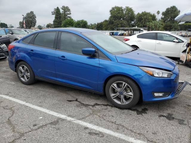 Photo 4 from auction – 2018 FORD FOCUS SE with VIN 1FADP3FEXJL287791