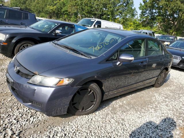 HONDA CIVIC HYBR 2010 with VIN JHMFA3F21AS000871 - Photo from auction