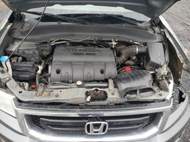 Photo 11 from auction – 2011 HONDA RIDGELINE with VIN 5FPYK1F21BB010172