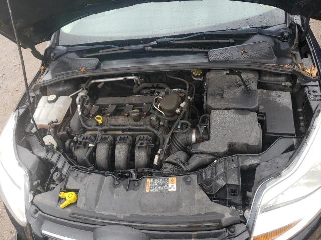 Foto 11 de la subasta – 2014 FORD FOCUS SE con VIN 1FADP3F21EL346349