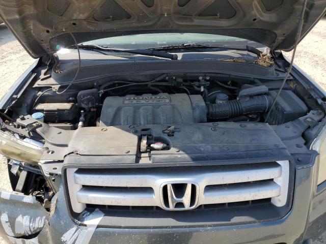 Photo 12 from auction – 2006 HONDA PILOT EX with VIN 2HKYF18526H532837