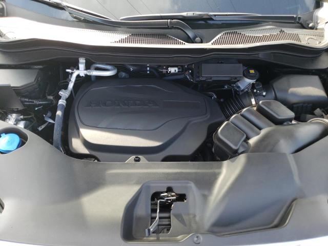 Photo 12 from auction – 2023 HONDA RIDGELINE with VIN 5FPYK3F5XPB042289