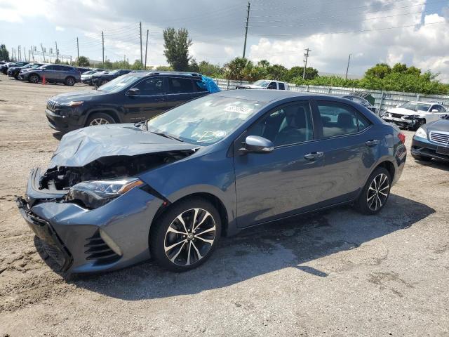 TOYOTA COROLLA L 2018 with VIN 5YFBURHE9JP801454 - Photo from auction