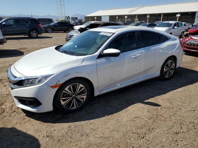 HONDA CIVIC EX 2018 with VIN 19XFC1E35JE001079 - Photo from auction