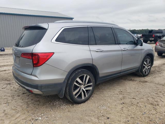 Photo 3 from auction – 2017 HONDA PILOT TOUR with VIN 5FNYF5H96HB030652