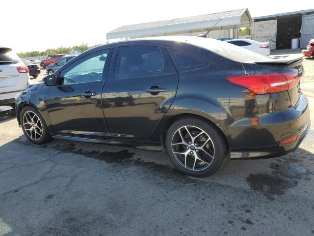 Снимка 2 от търг – 2015 FORD FOCUS SE с VIN 1FADP3F24FL294264
