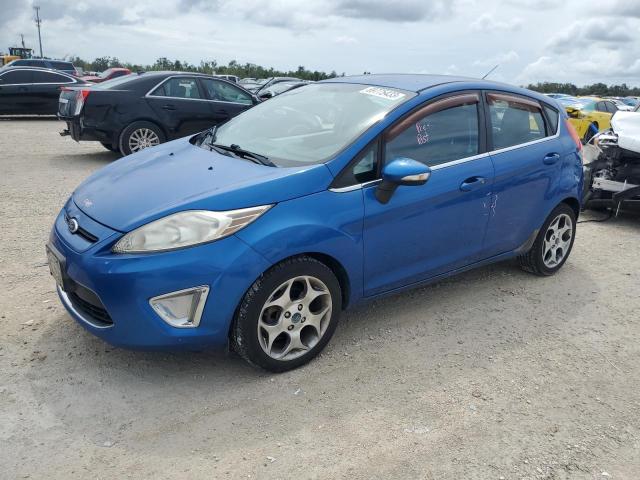 FORD FIESTA SES 2011 with VIN 3FADP4FJ6BM129113 - Photo from auction