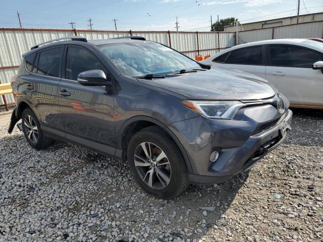 Photo 4 from auction – 2017 TOYOTA RAV4 XLE with VIN JTMWFREV3HJ106532
