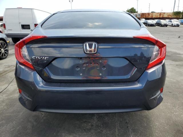 Photo 6 from auction – 2018 HONDA CIVIC LX with VIN 2HGFC2F57JH586338