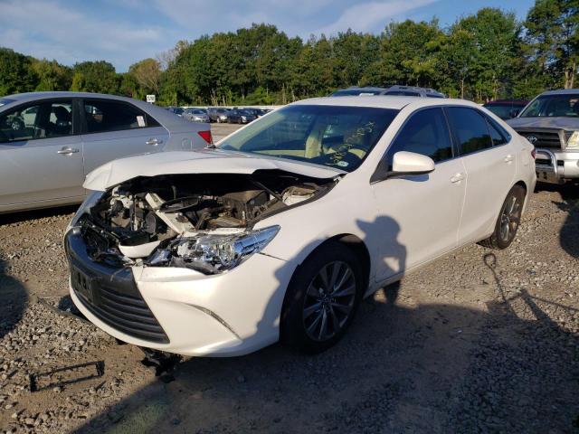 TOYOTA CAMRY LE 2016 with VIN 4T1BF1FKXGU227426 - Photo from auction