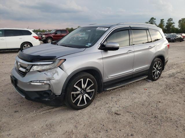 HONDA PILOT TOUR 2019 with VIN 5FNYF5H94KB019964 - Photo from auction