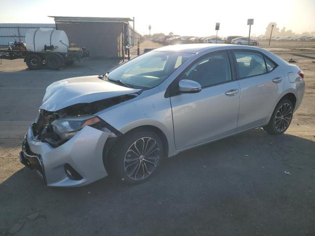 TOYOTA COROLLA L 2015 with VIN 5YFBURHE2FP233930 - Photo from auction