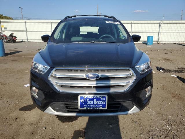Photo 5 from auction – 2018 FORD ESCAPE SE with VIN 1FMCU9GD8JUC84272