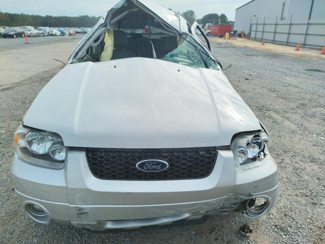 Photo 11 from auction – 2006 FORD ESCAPE HEV with VIN 1FMCU95H56KA43357
