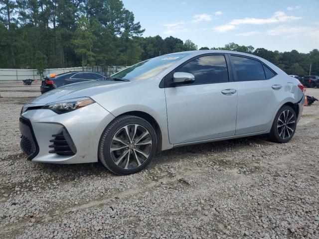 TOYOTA COROLLA L 2018 with VIN 2T1BURHE6JC057702 - Photo from auction
