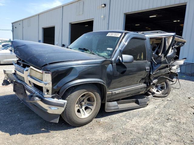 GMC SUBURBAN C 1999 with VIN 1GDEC16R7XJ734076 - Photo from auction