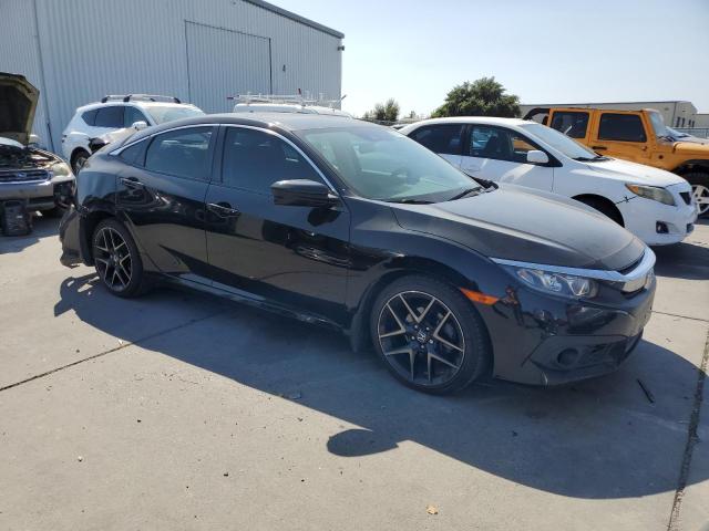 Фото 4 с аукциона – 2016 HONDA CIVIC EX с VIN 19XFC2F89GE214920