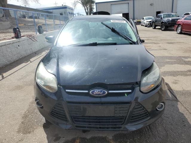 Photo 5 from auction – 2014 FORD FOCUS TITA with VIN 1FADP3N27EL192523