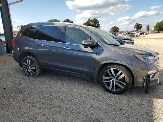 Photo 4 from auction – 2018 HONDA PILOT TOUR with VIN 5FNYF5H99JB004195