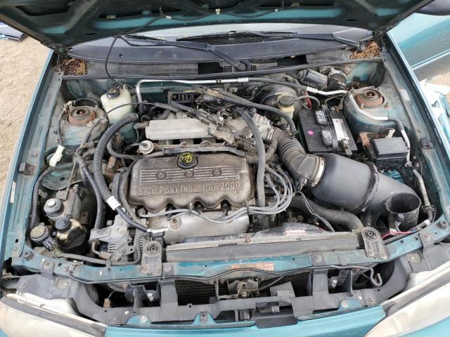 Photo 11 from auction – 1997 FORD ESCORT LX with VIN 1FALP13P4VW243053