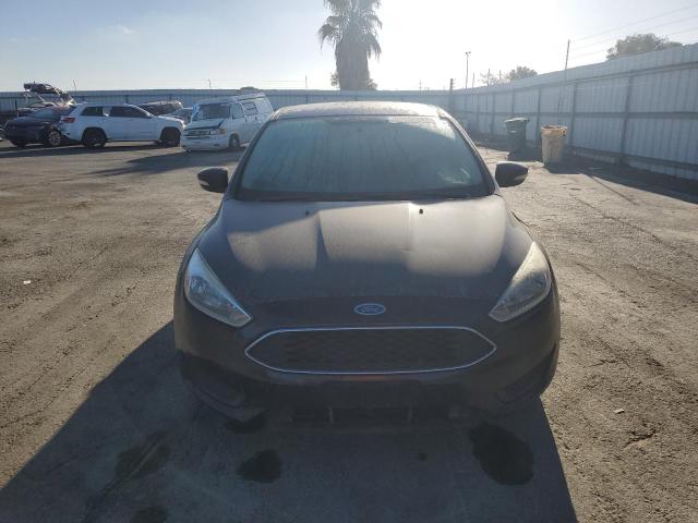 Снимка 5 от търг – 2015 FORD FOCUS SE с VIN 1FADP3K24FL316186