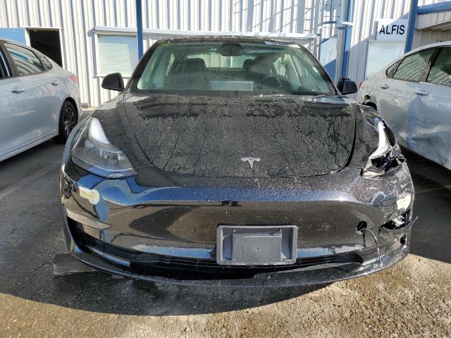 Photo 5 from auction – 2022 TESLA MODEL 3 with VIN 5YJ3E1EBXNF299035