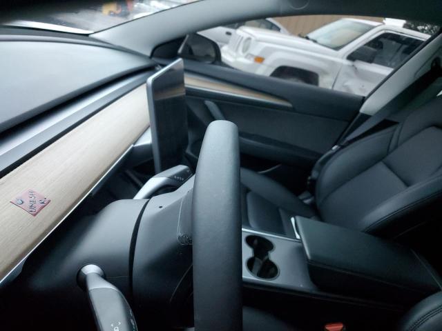 Photo 9 from auction – 2022 TESLA MODEL 3 with VIN 5YJ3E1EC7NF254000