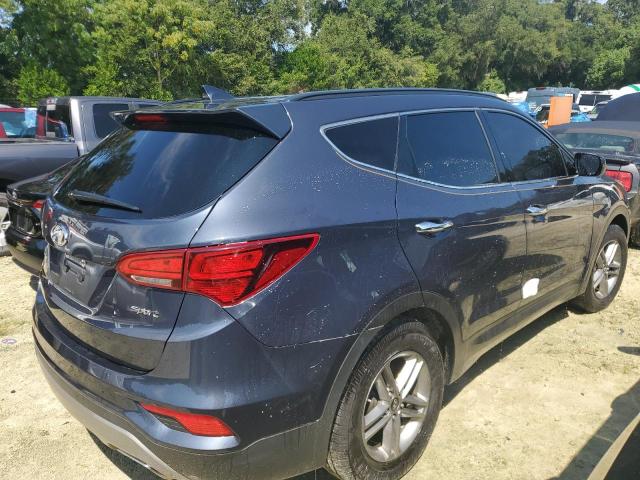 Photo 3 from auction – 2017 HYUNDAI SANTA FE S with VIN 5NMZU3LB3HH011015