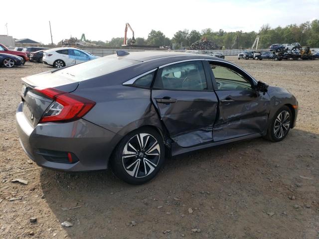 Photo 3 from auction – 2018 HONDA CIVIC EXL with VIN 2HGFC1F76JH643317