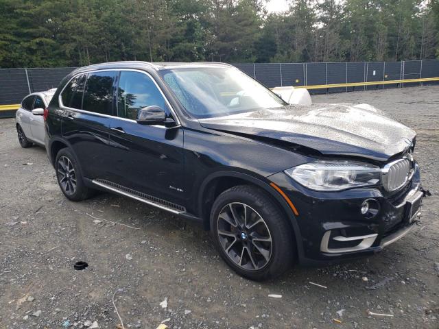 Photo 4 from auction – 2014 BMW X5 XDRIVE3 with VIN 5UXKR0C5XE0H18850