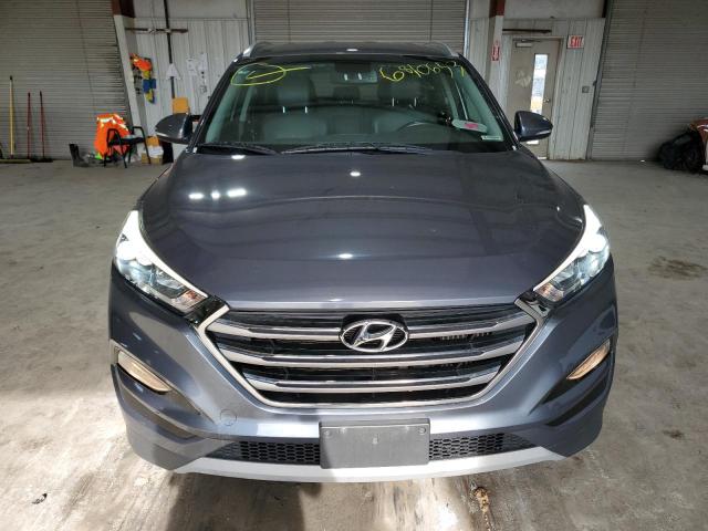 Photo 5 from auction – 2018 HYUNDAI TUCSON VAL with VIN KM8J3CA22JU752074