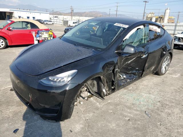 TESLA MODEL Y 2021 with VIN 5YJYGDEE0MF064489 - Photo from auction