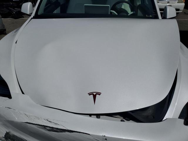 Photo 12 from auction – 2021 TESLA MODEL Y with VIN 5YJYGAEE1MF271780