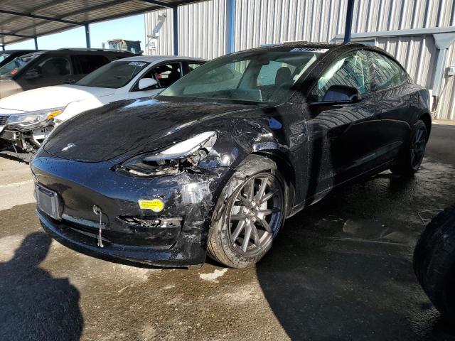 TESLA MODEL 3 2022 with VIN 5YJ3E1EBXNF299035 - Photo from auction